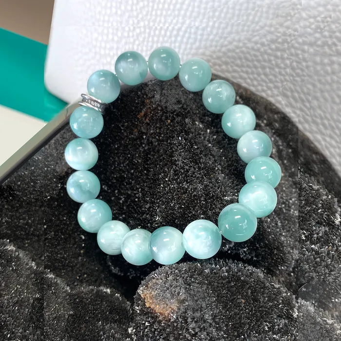 Bracelets Elisa Ilana Green Cats Eye Stretch Bracelet with Sterling Silver Charm Bracelets Elisa Ilana Green Cats Eye Stretch Bracelet with Sterling Silver Charm